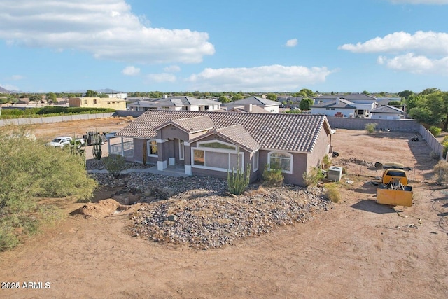 8343 W Calle Lejos, Peoria, AZ 85383 - view of front of house featuring a tile roof, stucco siding, and a residential view