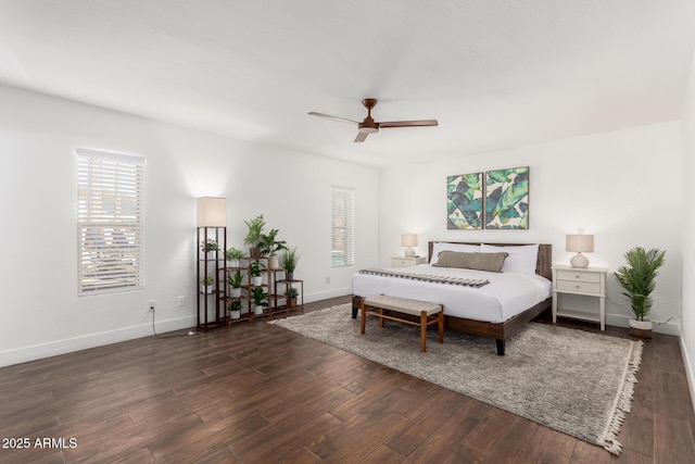 bedroom featuring dark wood-type flooring and ceiling fan