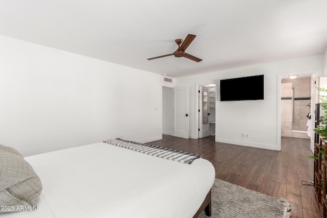 bedroom with ceiling fan and dark hardwood / wood-style floors