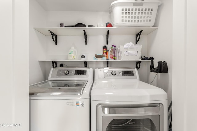 laundry area with separate washer and dryer