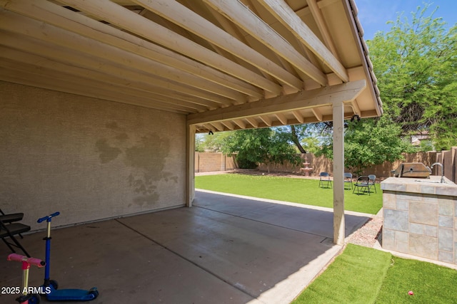 3821 N 125th Dr, Avondale, AZ 85392 - fenced backyard with a patio area