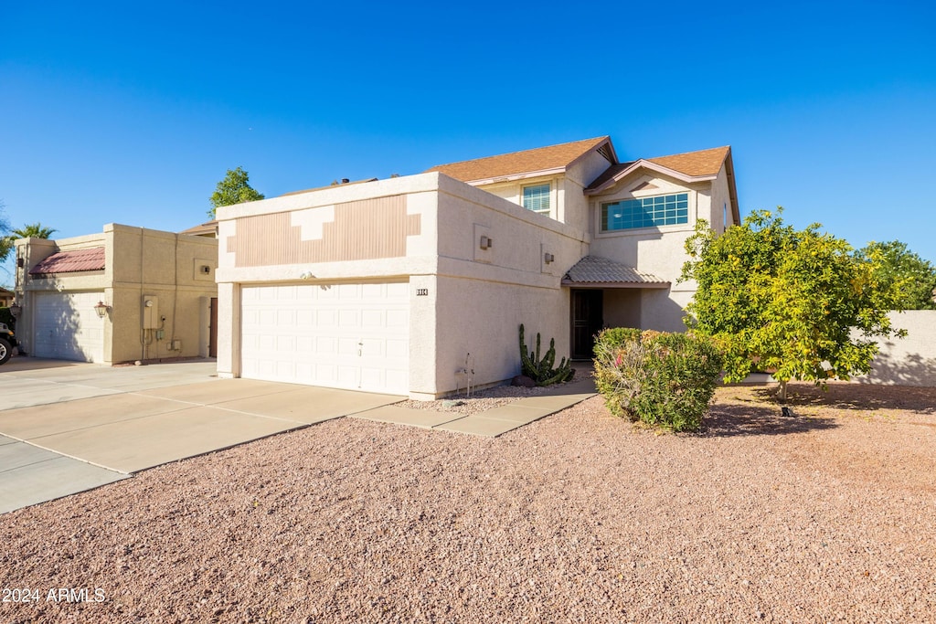 view of front of home with a garage