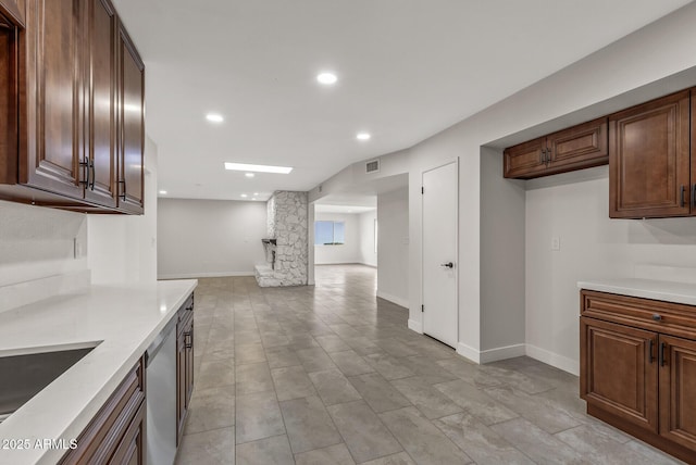 kitchen featuring light countertops, dishwasher, open floor plan, visible vents, and recessed lighting