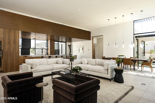 tiled living room with a wealth of natural light