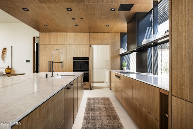kitchen with visible vents, wood ceiling, modern cabinets, a sink, and light tile patterned flooring
