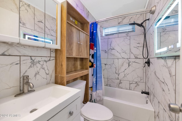 full bathroom featuring tile walls, sink, shower / tub combo, and toilet