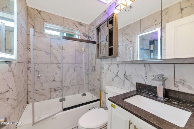 full bathroom with vanity, toilet, enclosed tub / shower combo, tile walls, and tasteful backsplash