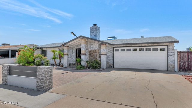 view of front of property with a garage