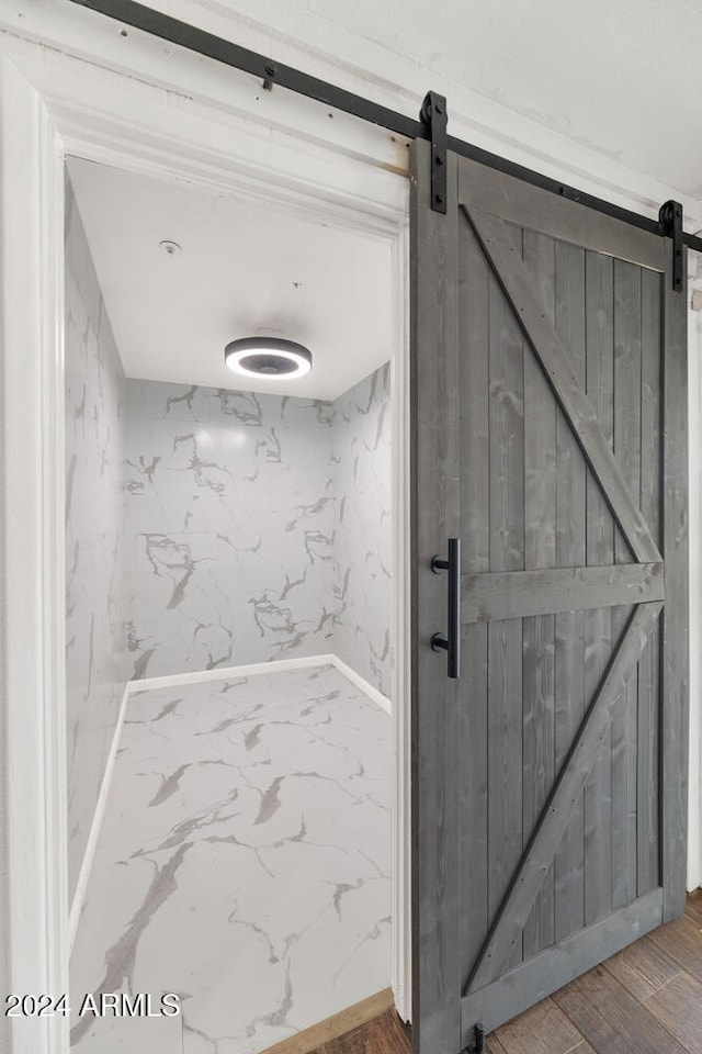 bathroom with wood-type flooring