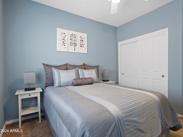 carpeted bedroom with a closet and ceiling fan