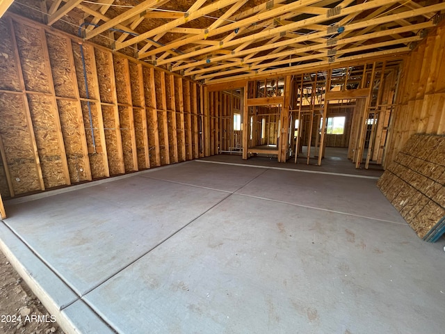 misc room with concrete flooring