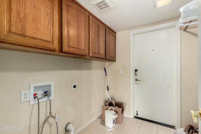 laundry room featuring washer hookup, hookup for an electric dryer, visible vents, cabinet space, and baseboards