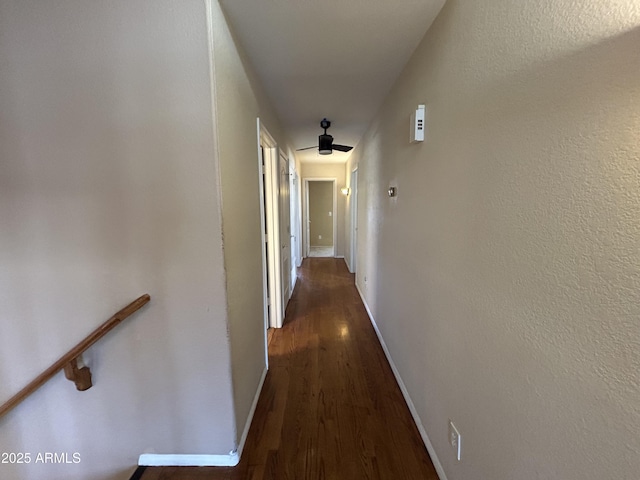 20713 N 56th Ave, Glendale, AZ 85308 - hallway with wood finished floors, baseboards, and an upstairs landing