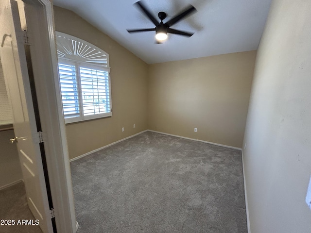 20713 N 56th Ave, Glendale, AZ 85308 - carpeted empty room featuring a ceiling fan, vaulted ceiling, and baseboards