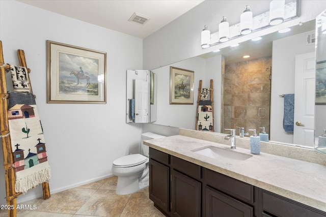 bathroom featuring a shower stall, toilet, baseboards, and visible vents