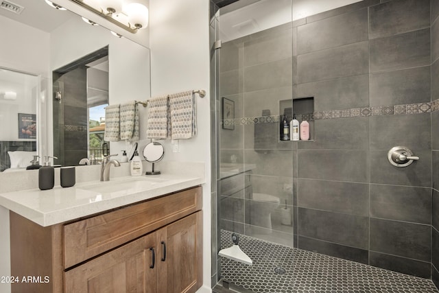 613 N Beaver St Unit 5, Flagstaff, AZ 86001 - bathroom featuring visible vents, vanity, and a stall shower