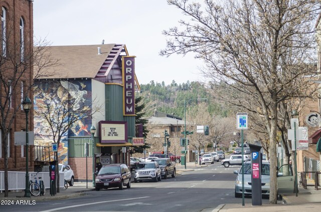 613 N Beaver St Unit 5, Flagstaff, AZ 86001 - view of road with curbs, street lighting, sidewalks, and traffic lights