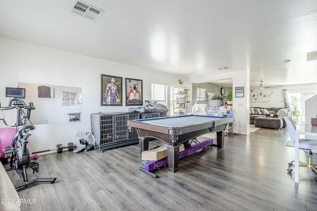 recreation room featuring visible vents, billiards, plenty of natural light, and wood finished floors