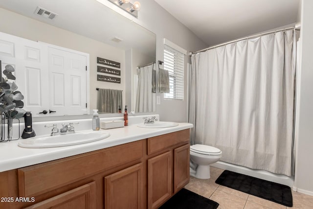 34913 N 30th Dr, Phoenix, AZ 85086 - bathroom featuring toilet, double vanity, tile patterned floors, and shower / bath combination with curtain