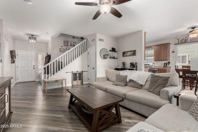 34913 N 30th Dr, Phoenix, AZ 85086 - living area featuring a ceiling fan, stairway, healthy amount of natural light, and wood finished floors