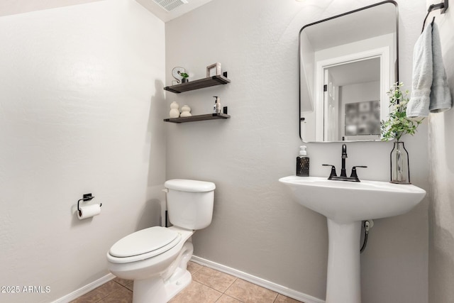 34913 N 30th Dr, Phoenix, AZ 85086 - bathroom featuring toilet, baseboards, and tile patterned flooring
