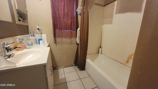 bathroom featuring shower / tub combo with curtain, tile patterned floors, and vanity