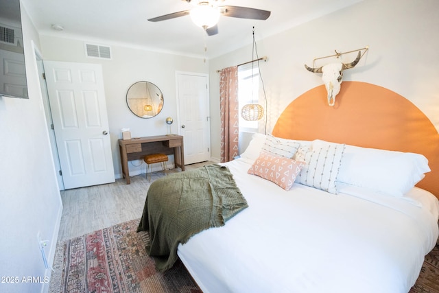 1513 E Sheridan St, Phoenix, AZ 85006 - bedroom featuring wood finished floors and ceiling fan
