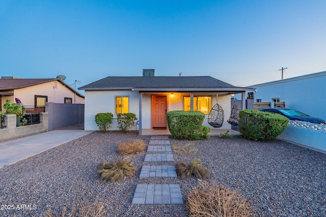 1513 E Sheridan St, Phoenix, AZ 85006 - view of front of property featuring covered porch, stucco siding, and roof with shingles