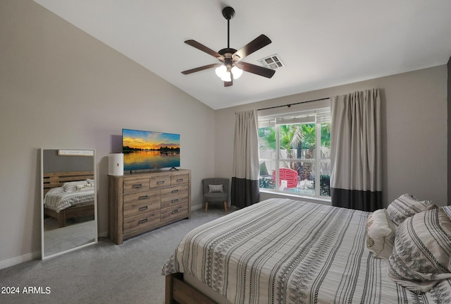 bedroom featuring lofted ceiling, light colored carpet, and ceiling fan