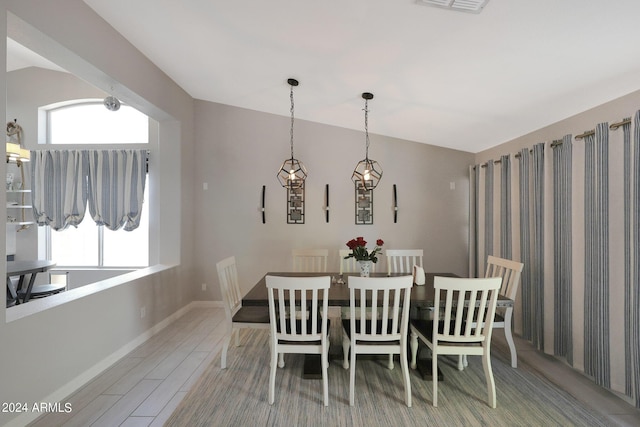 dining space featuring hardwood / wood-style floors