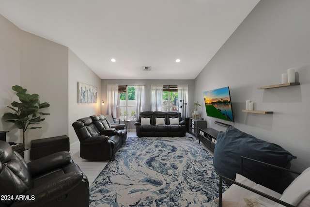 living room with lofted ceiling