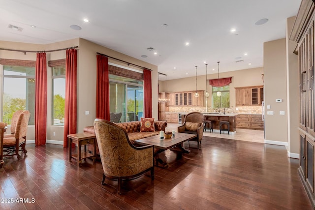 living room featuring dark wood-type flooring