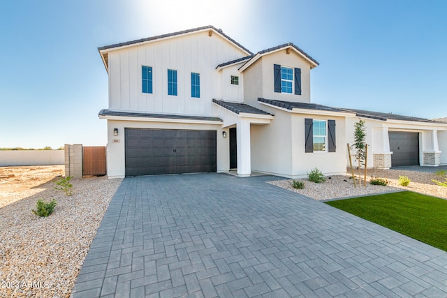 view of front of property with a garage