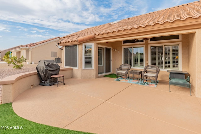 view of patio / terrace with a grill