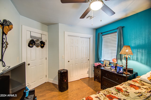 bedroom featuring ceiling fan and wood-type flooring