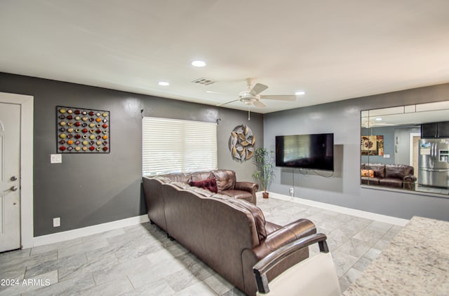 living room with ceiling fan