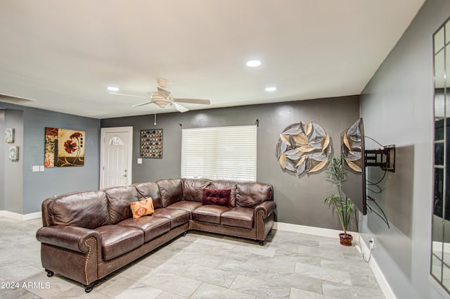 living room with ceiling fan