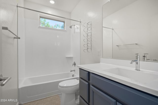 full bathroom with tile patterned floors, toilet, vanity, and tub / shower combination