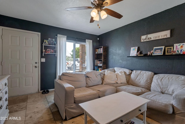 living room featuring ceiling fan