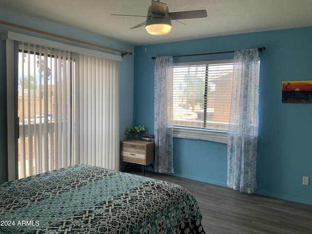 bedroom with wood-type flooring and ceiling fan