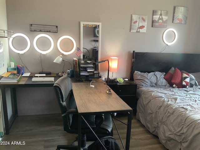 bedroom with wood-type flooring