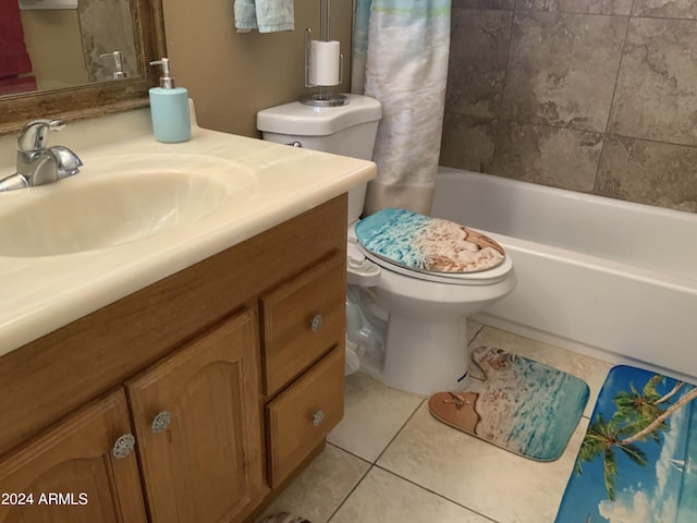 full bathroom featuring vanity, tile patterned flooring, toilet, and shower / tub combo