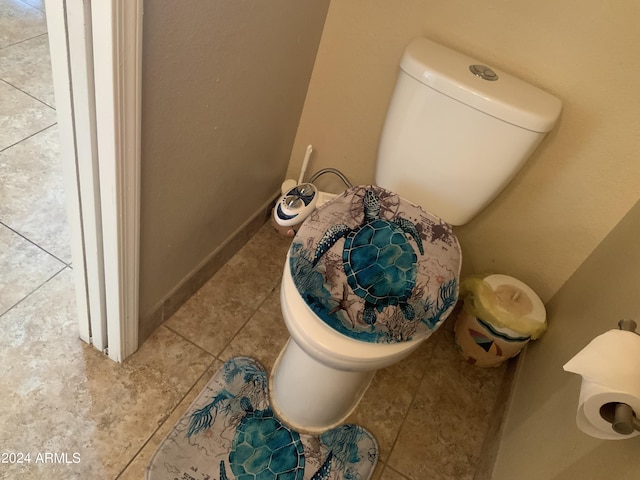 bathroom featuring tile patterned floors and toilet