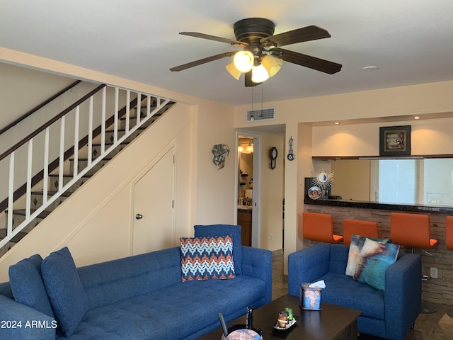 living room with ceiling fan