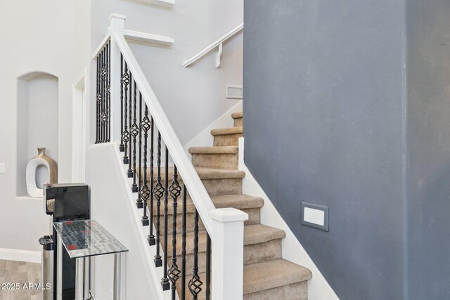 46141 W Rainbow Dr, Maricopa, AZ 85139 - stairway featuring wood finished floors and baseboards