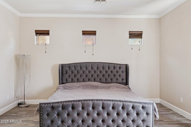 46141 W Rainbow Dr, Maricopa, AZ 85139 - bedroom featuring wood finished floors and ornamental molding