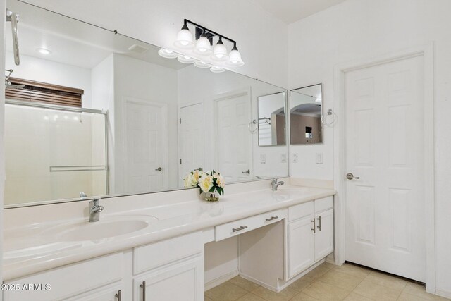 46141 W Rainbow Dr, Maricopa, AZ 85139 - bathroom with double vanity and tile patterned floors