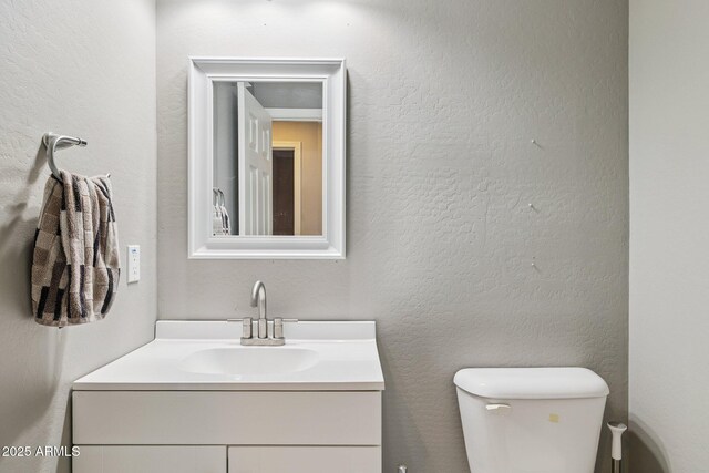 46141 W Rainbow Dr, Maricopa, AZ 85139 - half bath with vanity and toilet