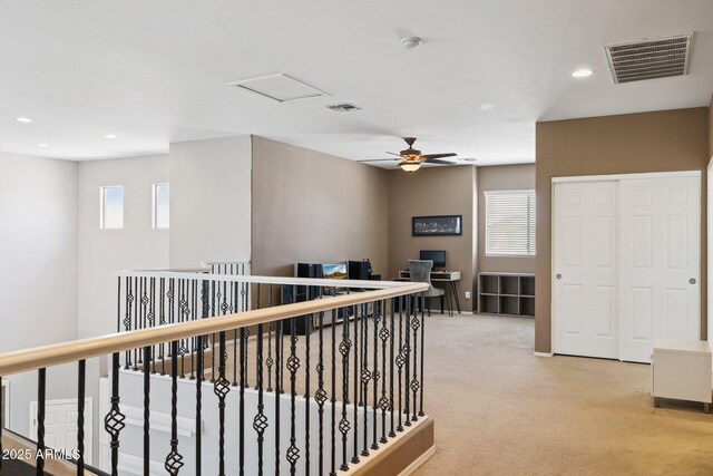 46141 W Rainbow Dr, Maricopa, AZ 85139 - hall featuring plenty of natural light, light carpet, recessed lighting, and an upstairs landing