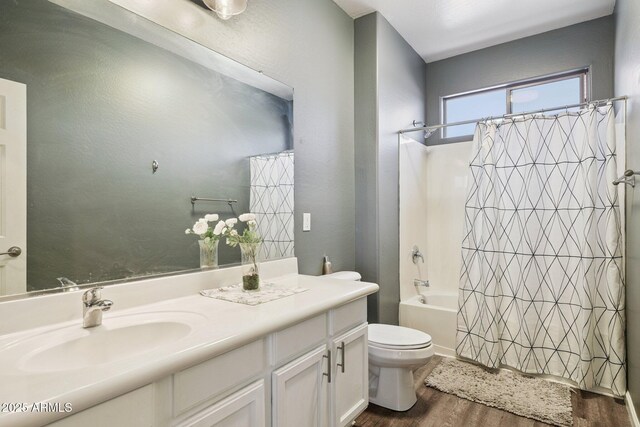 46141 W Rainbow Dr, Maricopa, AZ 85139 - bathroom featuring wood finished floors, vanity, and shower / tub combo with curtain
